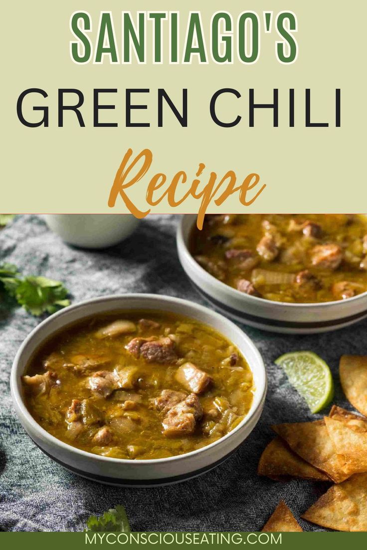 two bowls filled with green chili and tortilla chips on top of a table