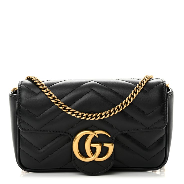 This is an authentic GUCCI Calfskin Matelasse Super Mini GG Marmont Shoulder Bag in Black. This shoulder bag is crafted of smooth calfskin leather in black with chevron quilting and a quilted heart at the back. This bag features a removable aged gold chain strap and an aged gold GG logo on the front. The flap opens to a beige microfiber interior with a removable key ring. Gucci Marmont Bag, Gucci Crossbody Bag, Gucci Crossbody, Small Messenger Bag, Vintage Monogram, Chevron Quilt, Gg Logo, Gucci Shoulder Bag, Gg Marmont