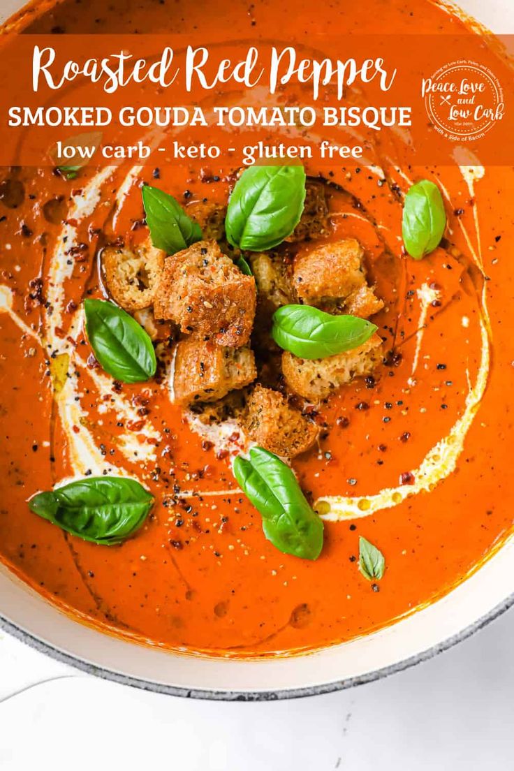 roasted red pepper and smoked gourmet tomato biscuit soup in a white bowl