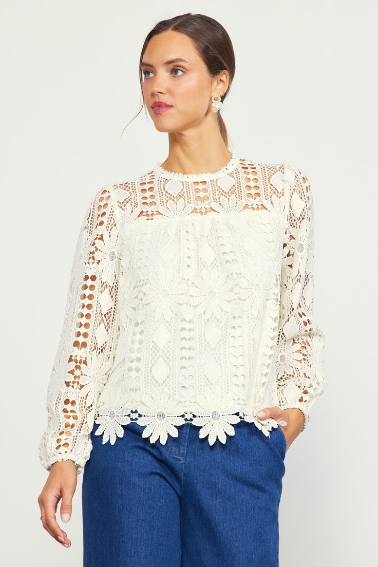 Crafted from embroidered open-eyelet lace, this long-sleeve blouse has lots of textural richness. It's got a floral motif woven in, creating a standout scalloped hem. The airy top features a round neckline and a back keyhole that's fastened by a loop button at the interior. •Round neckline •Long sleeves •Partially lined •Back keyhole with button •Relaxed fit Item Number: 45924 100% POLYESTER Chic Long Sleeve Crochet Top For Spring, Chic Long Sleeve Blouse With Lace Work, Long Sleeve Lace Top For Spring, Spring Long Sleeve Lace Tops, Spring Lace Blouse With Lace Trim, Chic Long Sleeve Lace Work Blouse, Long Sleeve Broderie Anglaise Blouse For Fall, Lace Tops With Floral Embroidery For Brunch, Broderie Anglaise Long Sleeve Blouse For Fall