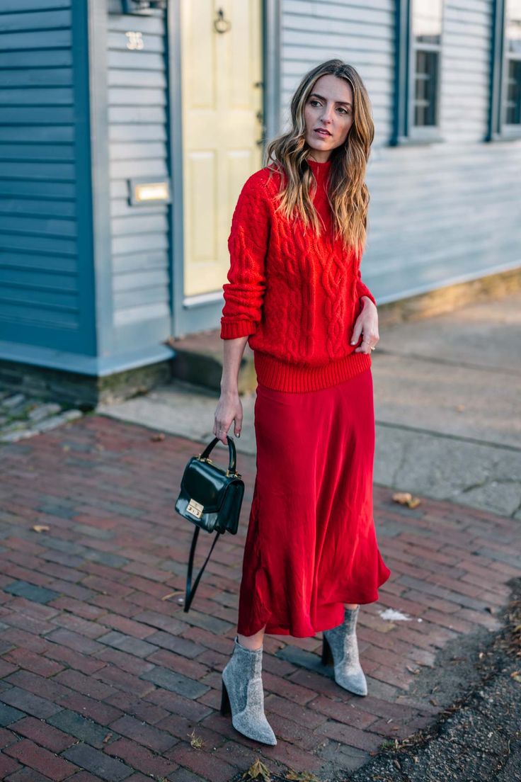 Color of the Moment: How to Wear Red this Season | Jess Ann Kirby wears red on red for a festive holiday monochromatic look Slip Dress Outfit Winter, Outfit Vestido Rojo, Red Satin Skirt, Red Skirt Outfits, Red Top Outfit, Fab Frocks, Slip Dress Outfit, Trendy Party Outfits, Red Cable Knit Sweater