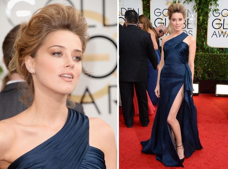 an image of a woman in a blue dress on the red carpet at the golden globe awards