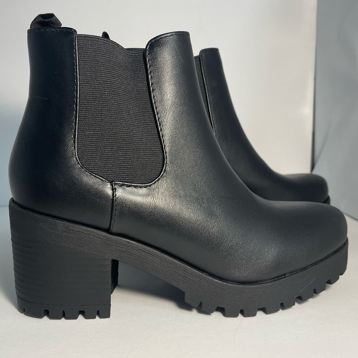 Black Angle Boots Size 9 Brand New Has A Small Scuff (Shown In Picture) Quick Shipping Thank You For Visiting! Casual Black Ankle Platform Boots, Casual Chelsea Boots With Stacked High Heel, Casual Black Heels With Padded Ankle, Casual Synthetic Ankle Boots, Trendy Black Boots With Padded Ankle, Casual Black Platform Boots With Padded Ankle, Trendy Black Ankle Heeled Boots, Black Chelsea Boots With High Stacked Heel, Casual High Heel Chelsea Boots With Reinforced Heel