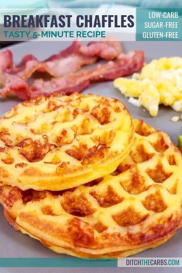 two waffles are stacked on top of each other with bacon in the background