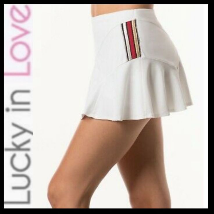 Nwot Lucky In Love Striped Flounce Skort Sz L (12) Flirty Silhouette Attached Shorts 4-Way Stretch Moisture Wicking Metallic Side Striped Waist Measures Approx 16” Across Length Approx 13” Shorts Inseam Approx 3.5” White/Red/Gold/Silver Polyester/Lycra Tags Removed, Never Worn Sporty White Skort For Day Out, Chic White Skort With Built-in Shorts, White Skort With Built-in Shorts For Day Out, Trendy White Stretch Skort, White Short Length Skort For Summer, White Summer Skort Short Length, White Short Summer Skort, White Short Skort For Day Out, Fitted White Summer Shorts