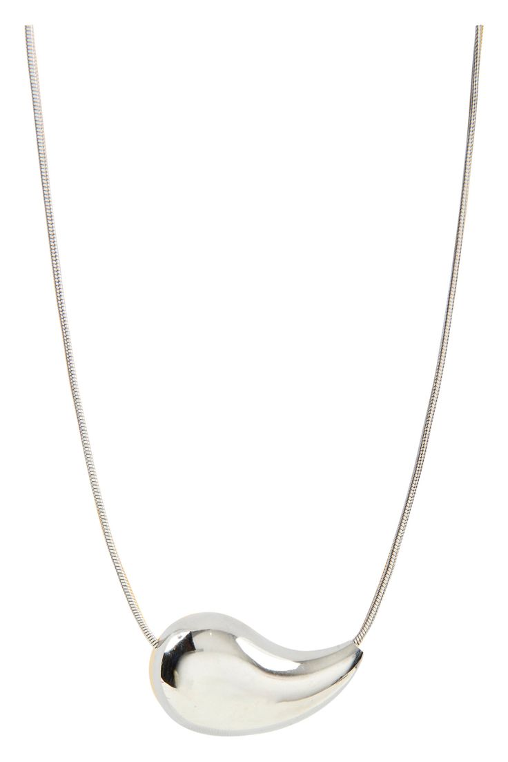 STYLE DETAILS: Discover the secret to refining your style with the Halcyon Necklace. The minimalist allure of this necklace is heightened by the graceful droplet pendant threaded through the metal chain, complete with an adjuster to tailor the fit to your liking. Pair it with a matching ring and earring to round out your ensemble. FEATURES: Choker necklace Adjustable chain Droplet Pendant Gold Plated, Stainless Steel 40cm length Modern Delicate Chain Necklace With Pendant, Modern Pendant Chain Necklace With Delicate Chain, Modern Delicate Chain Necklace With Round Pendant, Minimalist Silver Chain Pendant Necklace, Modern Clavicle Chain Pendant Necklace, Modern Teardrop Pendant Necklace For Everyday, Modern Everyday Teardrop Pendant Necklace, Modern Pendant Chain Necklace, Metal Drop Necklace With Collar Chain