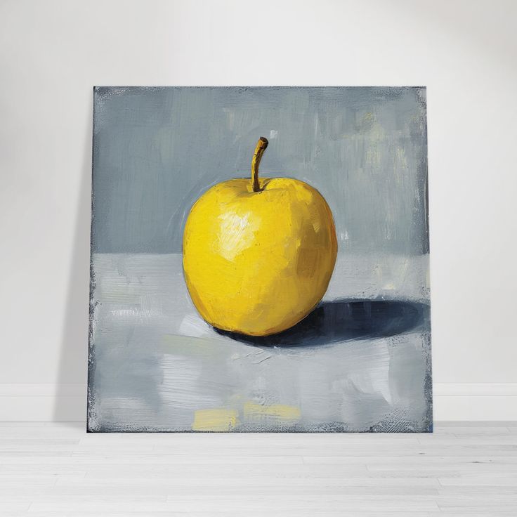 an apple is sitting on the floor in front of a white wall with a gray background