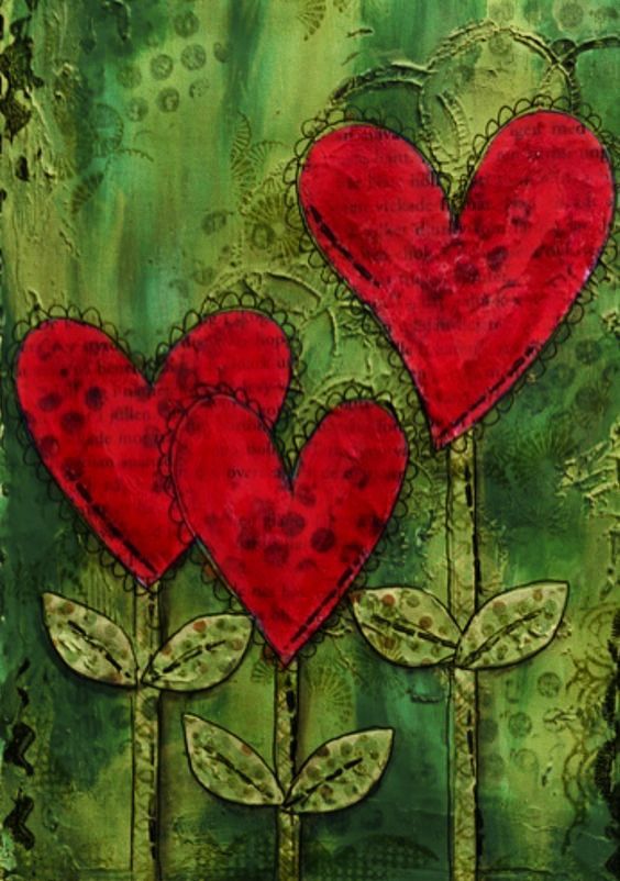 three red hearts sitting on top of a green and blue background with leaves in the middle