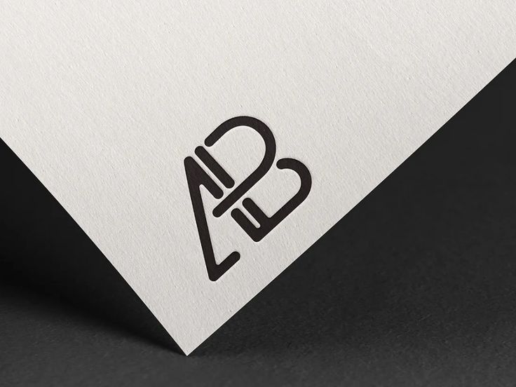 the letter b and c is placed on top of a white paper with black lettering