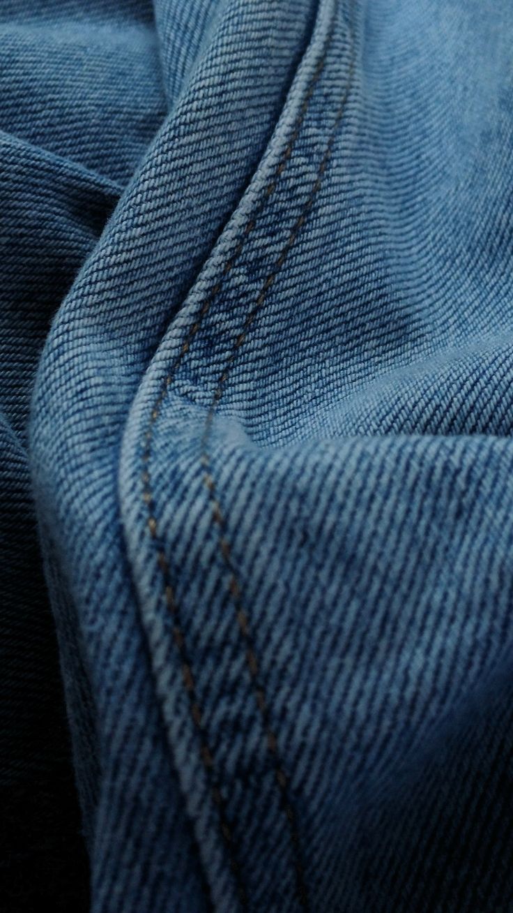 a close up view of the back pocket of a pair of jeans