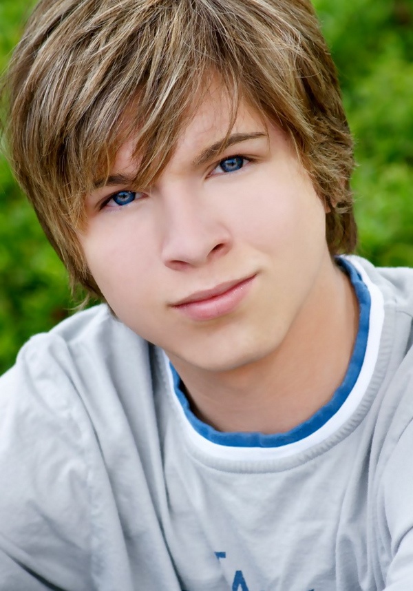 a close up of a person with blue eyes