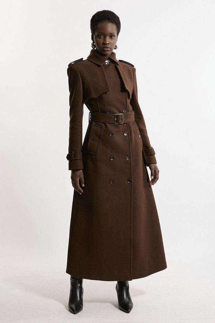 Feel Elevated No Matter The Weather In Our Midaxi Length Coat, Made In High Quality, Thick Italian Wool, Featuring A Fit That Flatters The Figure And A Dramatic, Long Length. The Double Breasted Buttons And Collared Neckline Make For A Classic, Traditional Piece That Maintains A Heightened Level Of Formality. Wear It Over Any Outfit, Whether Heading Out For Dinner Or To The Office. Italian Wool Tailored Belted Trench Coat High Quality Italian Wool Fabric Flattering Fitted Bodice Straight Hanging Trench Coat Outfit Italy, Dramatic Classic Outfits, Trench Coat With Dress, Brown Trench Coat Outfit, High Collar Coat, Formal Office Wear, Fancy Suits, Wool Dresses, Rain Coat Outfit