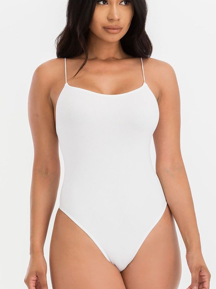 Soft and stretchy seamless bodysuit 92% Nylon, 8% Spandex Model is 5’7 and is wearing a size S/M Seamless Bodysuit, Spaghetti Strap Bodysuit, Strap Bodysuit, Waist Workout, Adore Me, Slim Waist, Jeans Dress, Sweater Jacket, Jumpsuit Romper