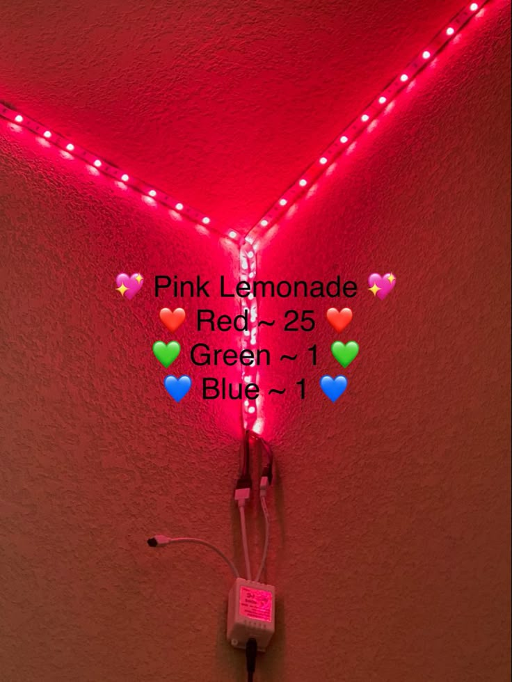 pink lemonade red 25 green - 1 bluu neon sign in the corner of a room