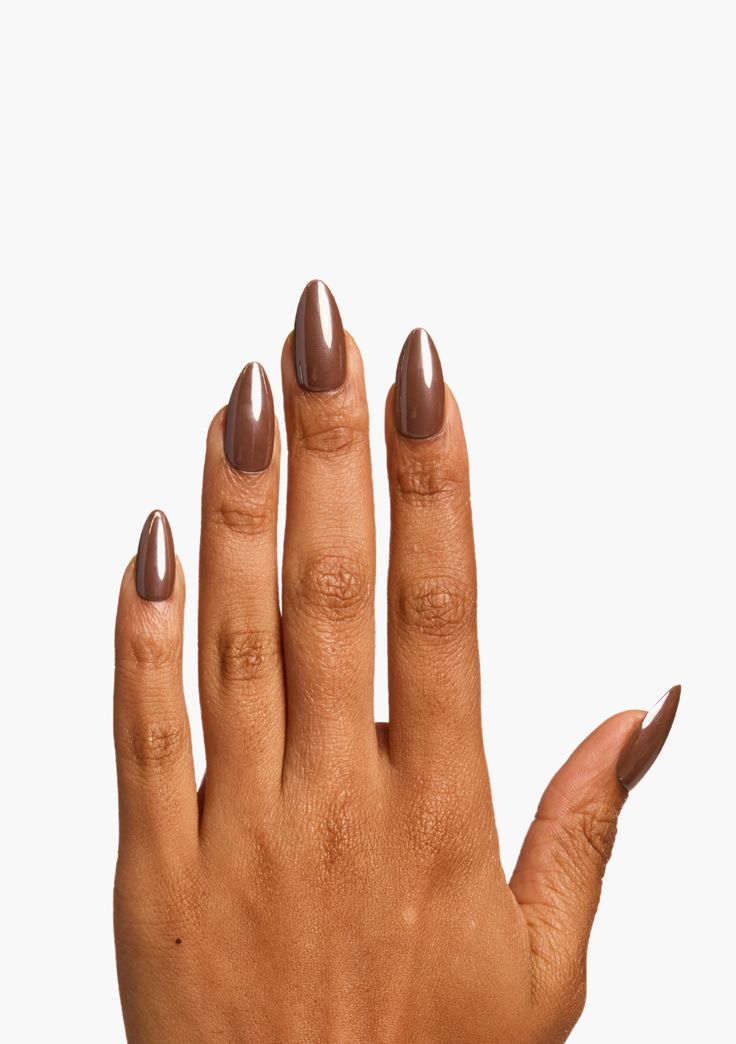 Get Hailey Bieber's nail look with The Ella Chocolate Glaze capture the rich warmth and sophistication of deep, velvety chocolate, adding a touch of luxury to your fingertips. Crafted from premium materials, such as acrylic or gel, these press-on nails boast a glossy finish that resembles the smooth glaze of fine chocolate confections.The deep brown hue exudes a sense of depth and allure, making a bold yet refined statement with every gesture. Whether you're attending a formal event or simply wa Nail Inspiration For Brown Skin, Hayley Bieber Nails Brown, Glazed Mocha Nails, Nails Chocolate Glazed, Glazed Chocolate Nails, Mocha Glazed Nails, Fall Glazed Nails, Chocolate Milk Nails, Brown Glossy Nails