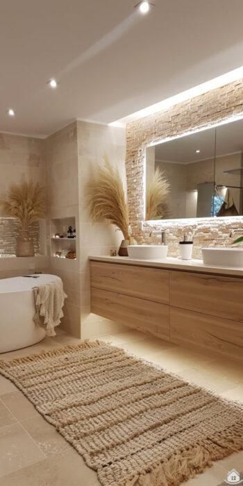 a bathroom with a bathtub, sink and rug in front of the tub area