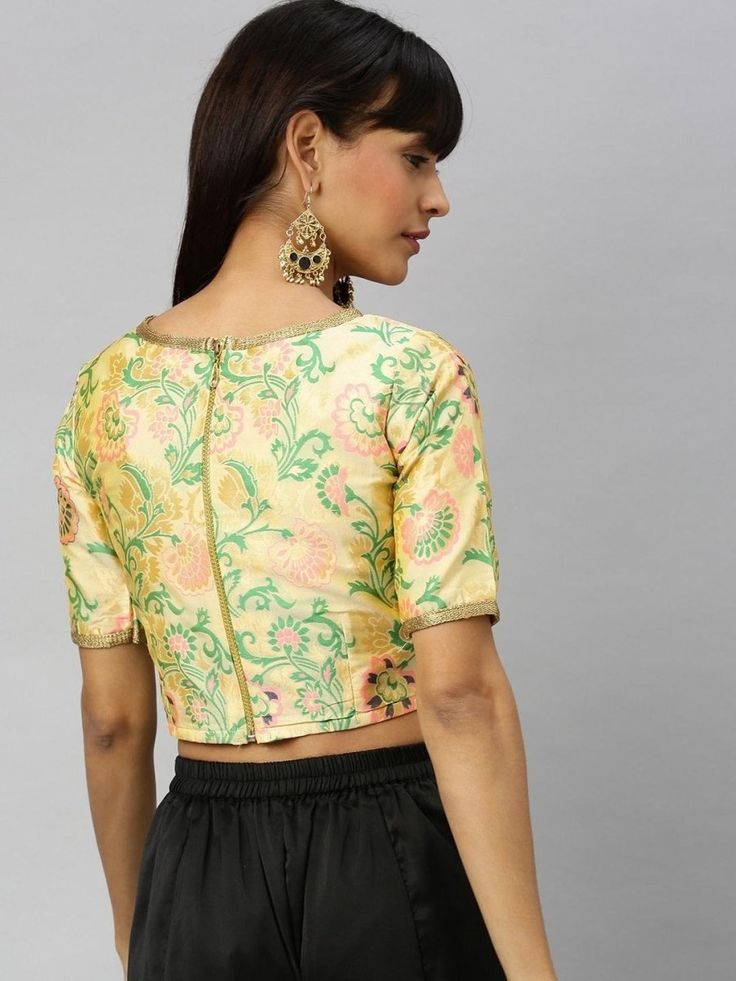 Woven cream crop top online for women which is crafted from brocade fabric with stunning woven fancy work. Fitted Embroidered Top With Motifs, Floral Embroidered Brocade Sets, Fitted Embroidered Top With Zari Work, Floral Embroidery Choli For Festivals, Brocade Top For Wedding, Traditional Fitted Cropped Crop Top, Fitted Brocade Top With Self Design, Fitted Brocade Top With Unique Design, Festive Crop Top With Pallu