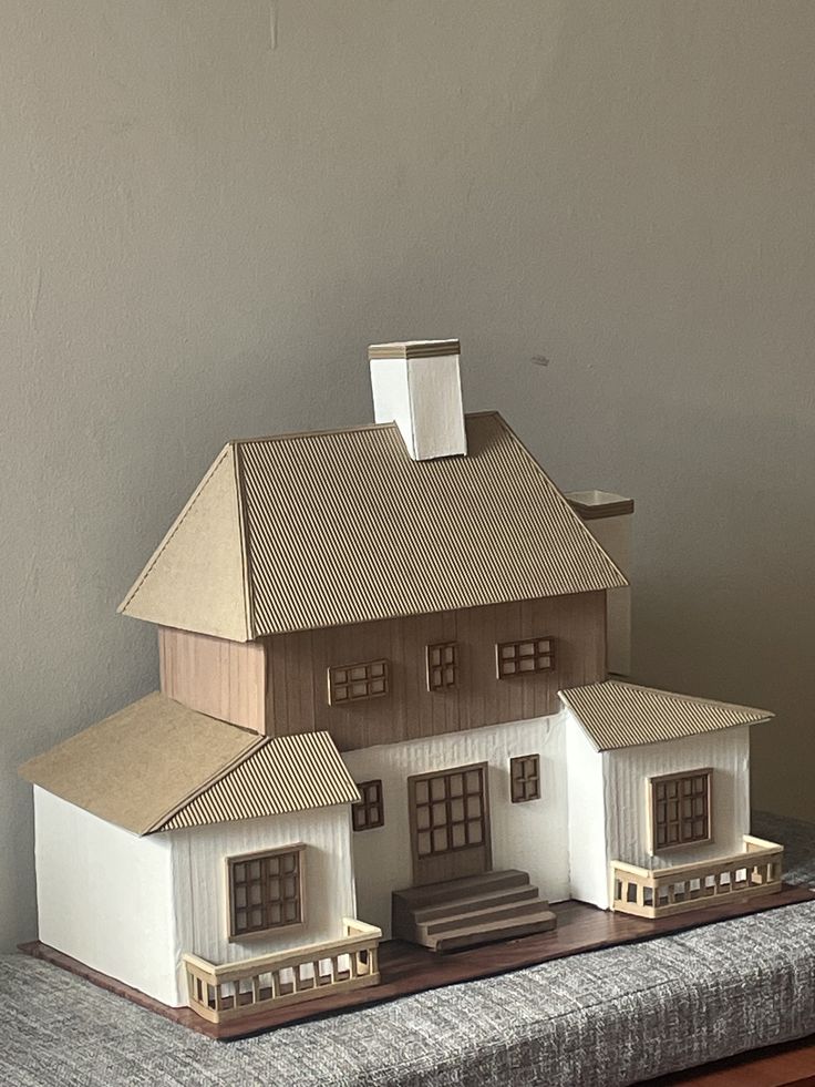 a model house sitting on top of a table