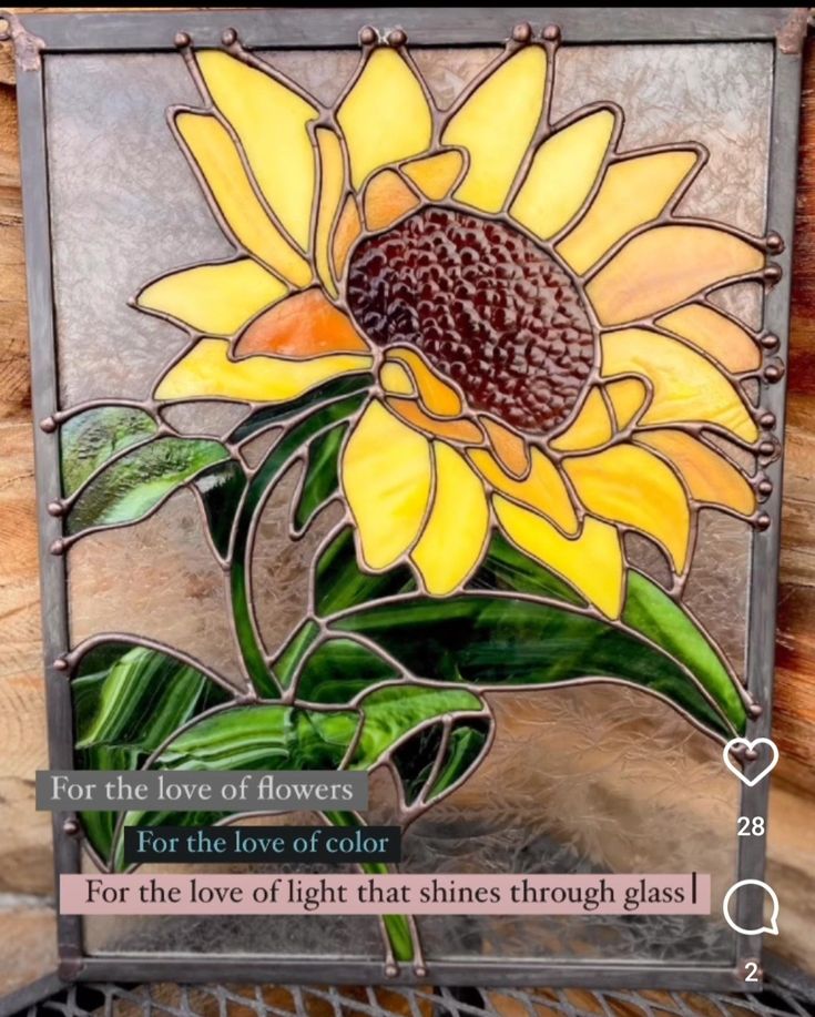 a sunflower stained glass panel with the words for the love of flowers on it