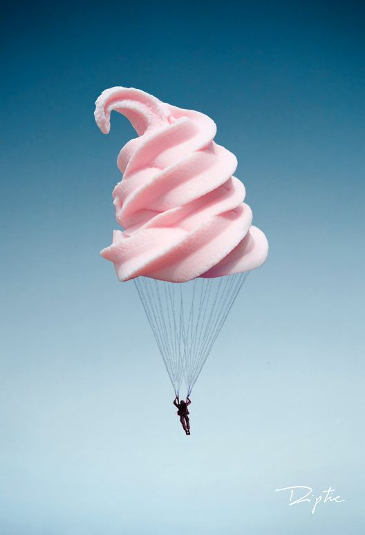 a person parasailing in the sky with pink icing