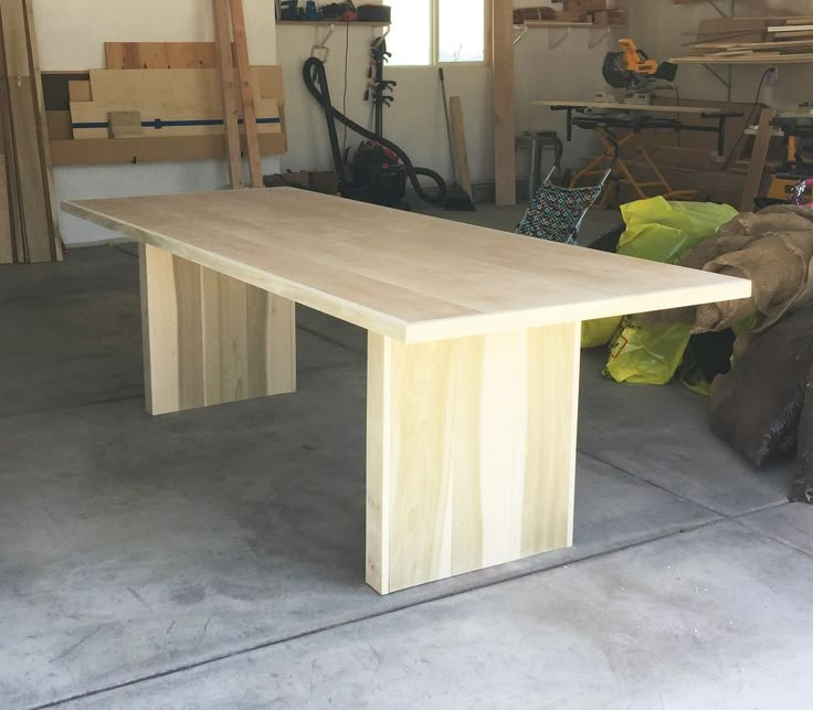 a table made out of wood in a garage