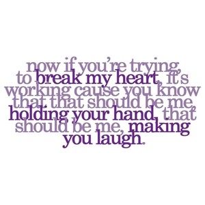 a purple and white photo with the words now if you're trying to break my heart it's working cause you know holding your hand