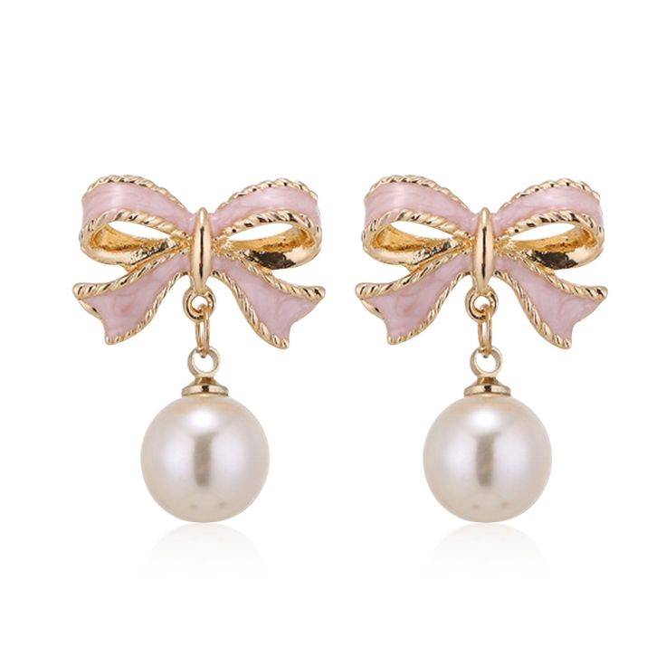 PRICES MAY VARY. Bow Pearl Earrings --- These pearl earrings with a dangling bow are the perfect accessory for any outfit, adding a touch of trendy and unique.It is perfect for date earrings party earring wedding earrings.Fashion and eye-catching design will certainly bring a lot of attention and help you win more praise. Size --- As shown in the figure,Due to manual measurement, there is an error of 1-2cm. Material --- Made of alloy, it is easy and comfortable to wear. Gift --- These gold and s Bride Earrings, Daily Jewelry, Wedding Party Jewelry, Rhinestone Bow, Bow Earrings, Christmas Gift Jewelry, Dream Jewelry, Pearl Drop Earrings, Elegant Earrings