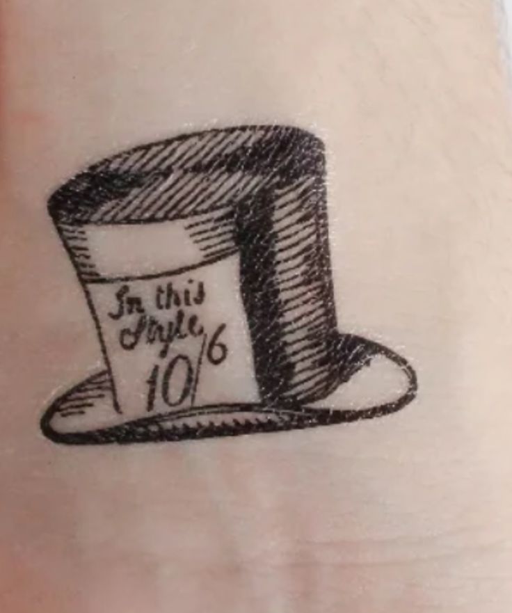 a drawing of a top hat with the words 10 th july on it's wrist