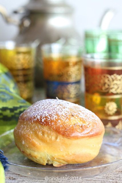 a pastry sitting on top of a glass plate