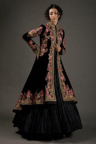 Black silk velvet long jacket with floral resham thread embroidery and hand work. 
Component: 1
Pattern: Embroidered
Type Of Work: Resham Thread Work
Neckline: Mandarin Collar
Sleeve Type: Long Sleeves
Fabric: Silk Velvet; Lining: Silk
Color: Black
Other Details: 
Floral motifs
Pleated hem
Asymmetric hem cut
Multi colored work
Front potli placket
Note: The inner dress worn by the model is not for sale
Occasion: Destination Wedding - Aza Fashions Fancy Maxi Dresses, Long Jacket For Women, Fancy Maxi, Fancy Maxi Dress, Long Jacket Dresses, Long Jackets For Women, Velvet Dress Designs, Maxi Dress Collection, Rohit Bal