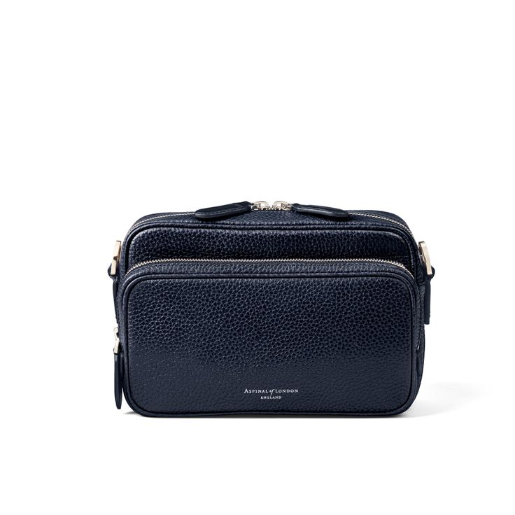 Reporter East-West Navy Leather Messenger Bag | Aspinal Leather Messenger Bags, Leather Wash Bag, Leather Messenger Bag Men, London Logo, London Bags, Handbag Essentials, Small Messenger Bag, Latest Bags, Billfold Wallet