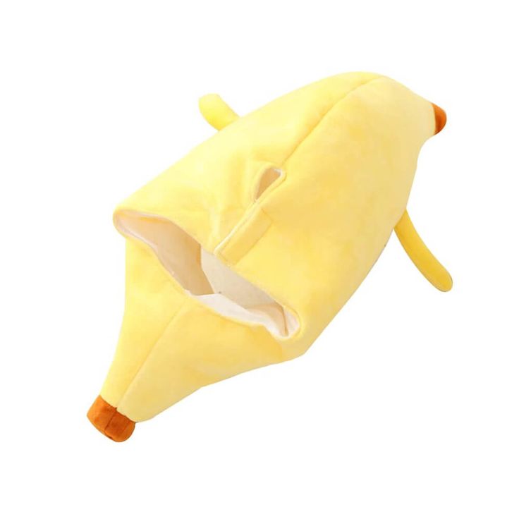 a banana shaped stuffed animal toy on a white background