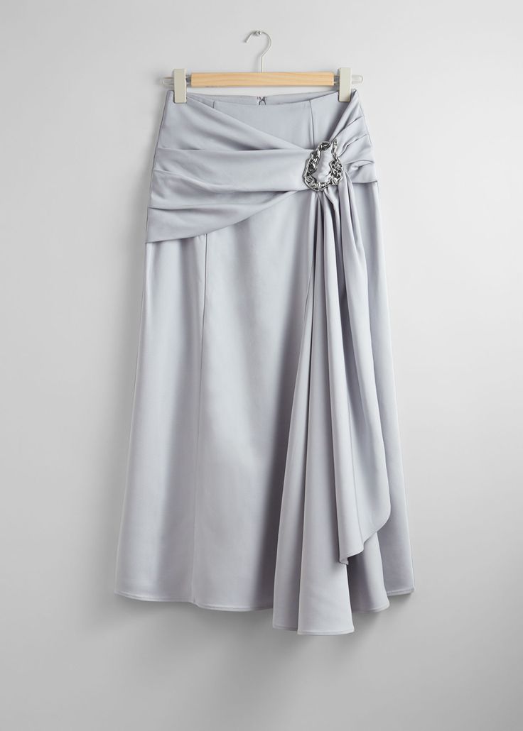 Midi skirt featuring a draped finish gathered at one side. Detailed with a silver-toned metal buckle.  • Zipper closure at the back Length of skirt: 93cm / 36.6" (EU 36 / UK 8 / US 4) Savoir is our limited collection honouring the know-how of our design ateliers with seasonal statement styles that push fashion forward. Draped Midi Skirt, Grey Drapes, Skirt Co Ord, Gray Skirt, Knitwear Cardigan, Cardigan Jacket, Vintage Jeans, Coat Dress, Piece Of Clothing