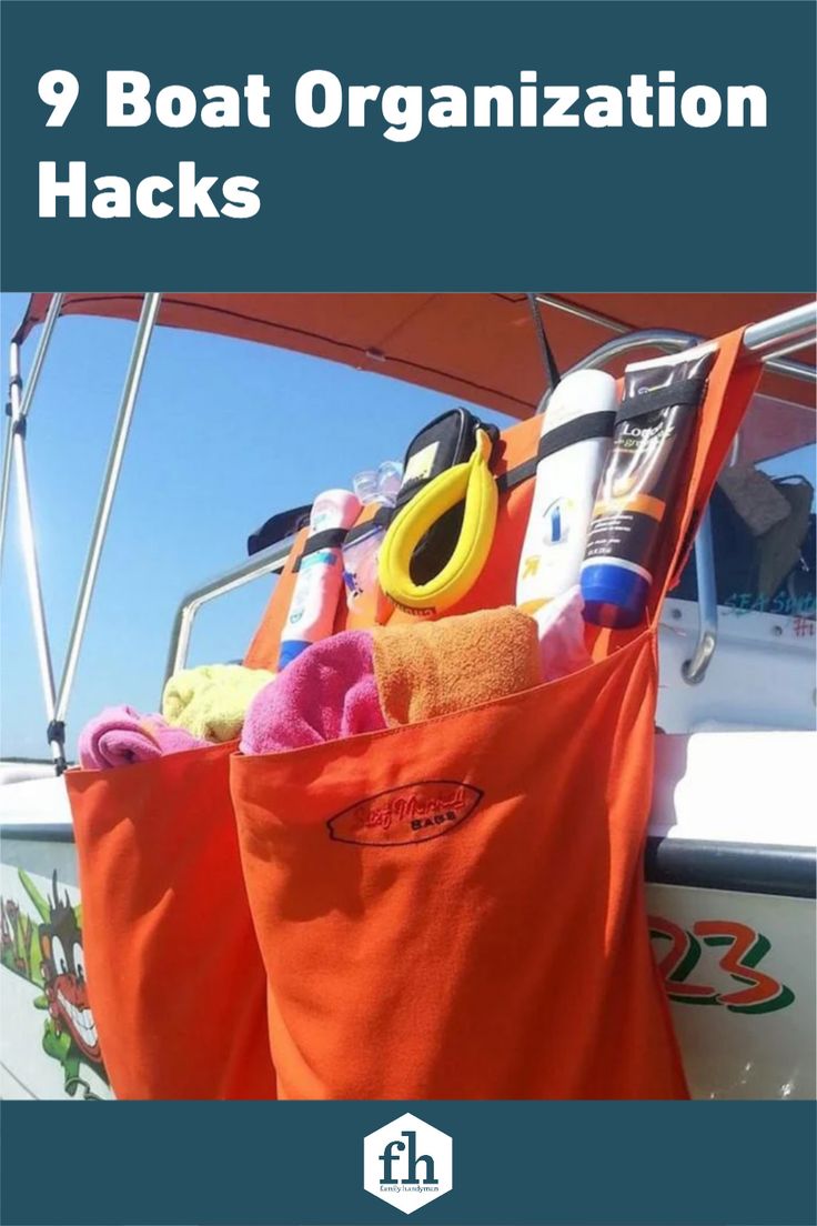 an orange bag filled with items on top of a boat