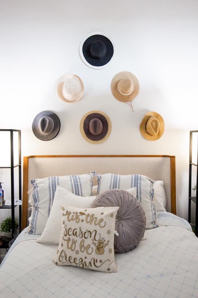 Hats Hanging Over Bed, Warehouse Apartment, Hat Wall, Hat Display, Command Hooks, Tropical Home Decor, Above Bed, Guest Bath, Upholstered Bed