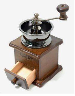 an old fashioned coffee grinder with a wooden stand on it's side and the lid open