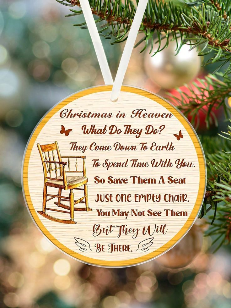 a christmas ornament hanging from a tree with the words, christmas in heaven what do they do?