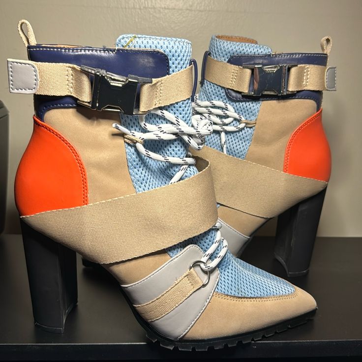 Steve Madden Illusion Multi Color Boots. Never Worn Perfect Condition. Size 8. I Am A True 7 1/2 And These Fit Me Perfectly. Comfortable And Easy To Walk In. Beige Leather, Mesh Light Blue, Orange, Navy Blue, Silver Buckle, White And Navy Shoe Lace. Trendy Orange Spring Boots, Casual Multicolor Lace-up Heels, Orange Pointed Toe Boots For Spring, Spring Orange Pointed Toe Boots, Leopard Print Ankle Boots, Trendy Block Heels, Color Boots, Platform Chelsea Boots, Short Leather Boots