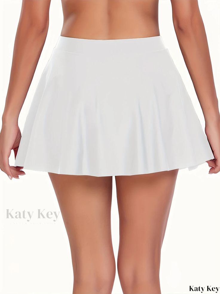 Katykey - Elegant Pleated Ruffle Skirt Swimwear Bottom: Versatile 2-in-1 Solid Color High-Stretch Bikini Bottom for Womens Beachwear and Swimwear Collection Stretch Solid Swim Skirt With Built-in Shorts, White Skirted Swim Skirt With Built-in Shorts, Solid High-waist Elastane Swim Skirt, Pleated Stretch Swim Skirt, Short, Skirt Swimwear, Solid Color 4-way Stretch Mini Swim Skirt, Beachwear For Women, Ruffle Skirt, Swimwear Collection