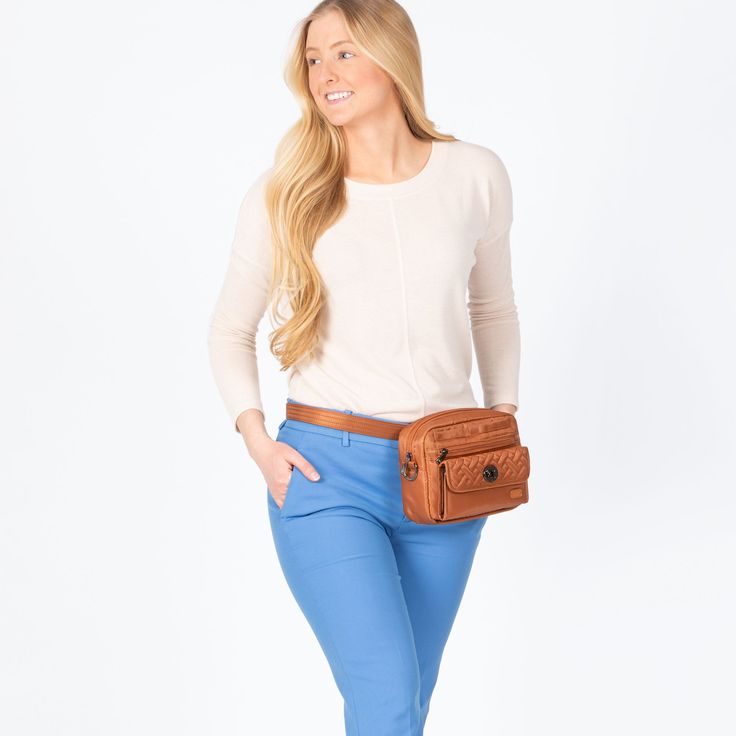 About Measurements Features The Switch crossbody is smart, sleek, and roomier than it looks. Three ways to wear and a removable strap allow you to carry this spacious bag as a crossbody, shoulder bag, or belt bag. Dimensions: 9"W x 6.25"H x 2.25"D Weight: 0.8 lb Strap Length: 29" to 56" Shoulder/Strap Drop: 12" to 26" Exterior Features: One main zipper compartment One front soft lined slip pocket with magnetic closure One front zipper pocket One front wallet compartment with turn key lock closur Wristlet Pouch, Convertible Crossbody Bag, Mobile Shop, The Switch, Midnight Black, Shopping App, Stay Connected, Miss A, Phone Screen