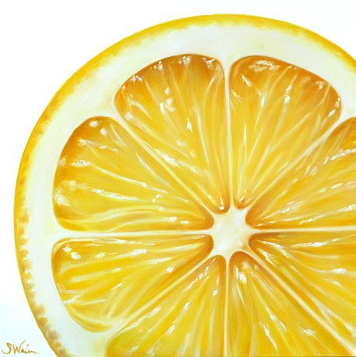 an orange cut in half on a white background