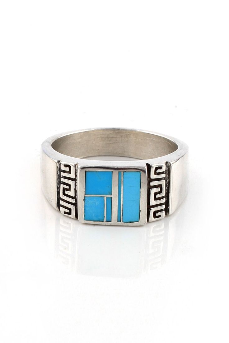 This Turquoise channel inlay men's ring features a modern square shape. The turquoise has a beautiful sky blue color. The sterling silver band is decorated with an attractive Greek Key pattern for a contemporary look. It has been oxidized to bring out the detail and polished to a high shine. This comfortable, low profile design allows your hand to slip easily in and out of jean pockets. The modern handsome look of this ring is also great for evening wear. Hallmarked by Navajo artist "Rick T" and Mens Ring Sizes, Sky Blue Color, Greek Key Pattern, Jean Pockets, Silver Eagles, Silver Feather, Mens Silver Rings, Modern Square, Turquoise Rings