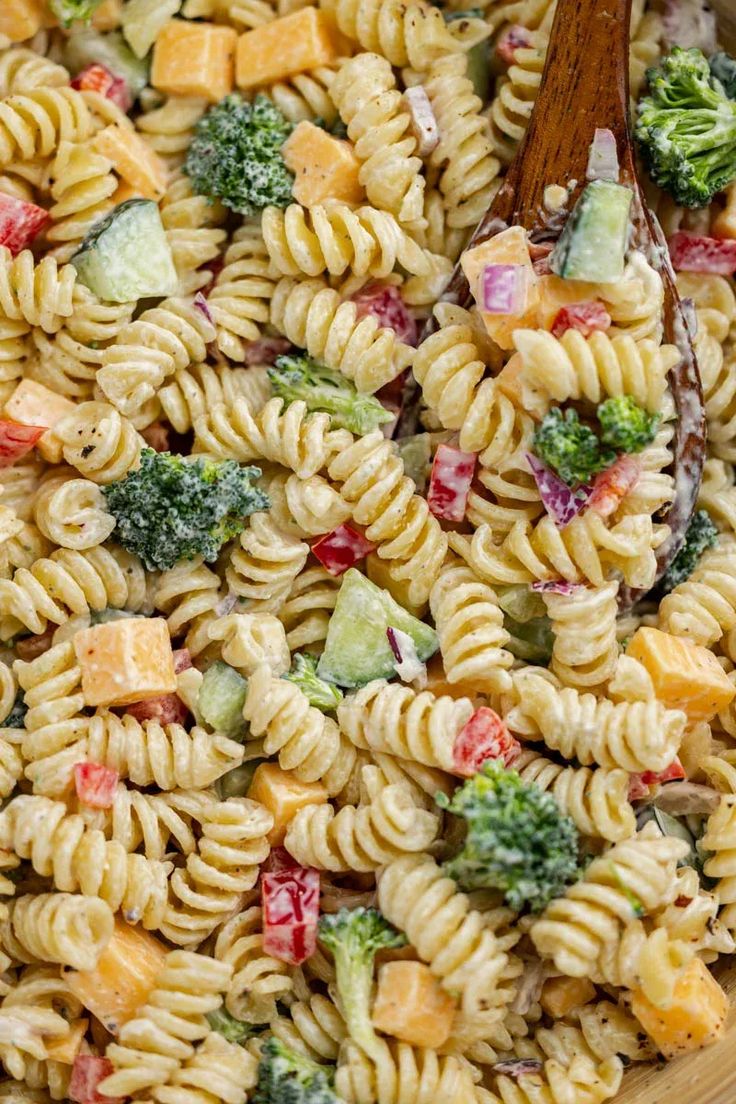 pasta salad with broccoli, cheese and other vegetables