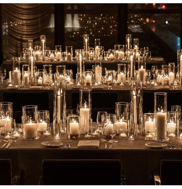 a long table with candles on it