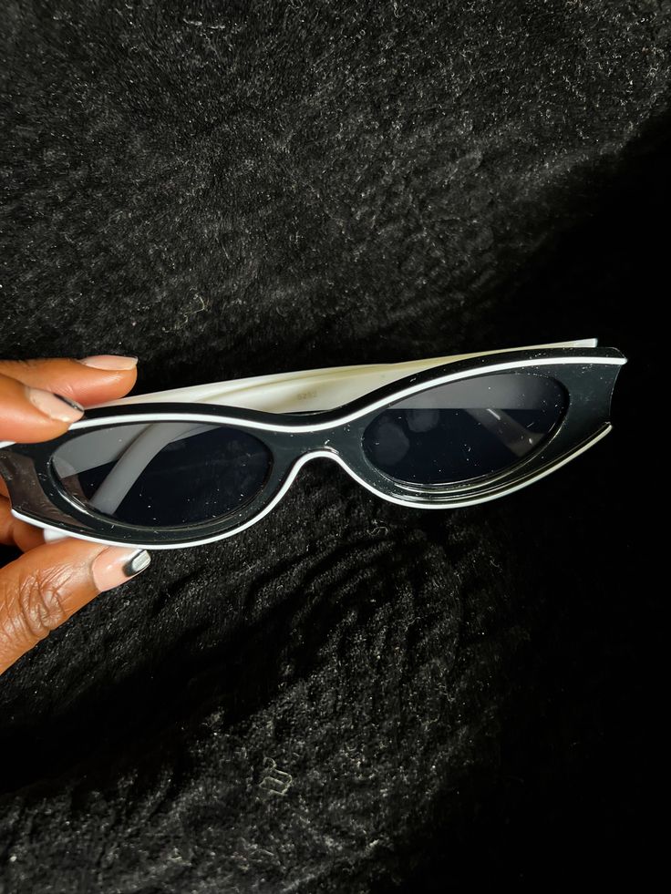 Dani Joh LUXE! These sunglasses provide amazing quality and comfort. The black and white detailed frames with have black lenses. Enjoy these exclusive sunglasses and show us how you'll rock them by using the hashtag #ShopDaniJoh. Sunglasses Features: Exclusive Black Sunglasses Black & White Sunglasses UV 400 Protection One Size Retro Black Sunglasses For The Beach, Retro Black Sunglasses With Mirrored Lenses, Trendy Black Cat Eye Sunglasses With Uv Protection, Trendy Black Cat Eye Sunglasses With Tinted Lenses, Black Gold Sunglasses, White Sunglasses, Uv Sunglasses, Boss Black, Gold Sunglasses