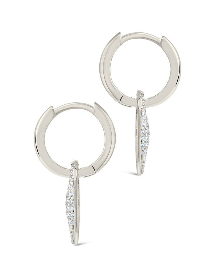 Get the sparkle and style you crave with the Avery CZ Charm Hoops. These dazzling hoop earrings feature CZ stones to bring extra sparkle to any outfit, with a look that's sure to turn heads! Who doesn't love a bit of extra sparkle? Materials: 14K gold plated sterling silver or sterling silver, cubic zirconia Features: 1.1" drop, 0.4" width, 1mm CZ stones, Lead & Nickel free, post back Figaro Chain Necklace, Pearl Chain Necklace, Free Post, Pearl Chain, Cz Stone, Silver Hoop Earrings, Gold Plated Sterling Silver, Cubic Zirconia, Silver Tone