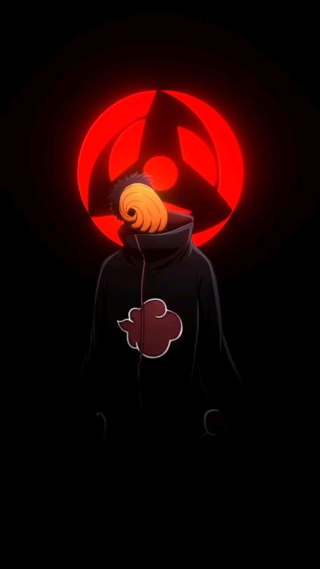 an anime character wearing a black hoodie with a red light behind him