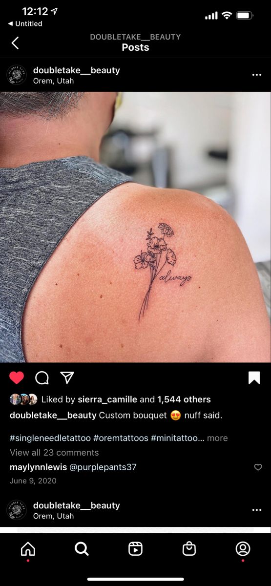 a person with a flower tattoo on their shoulder