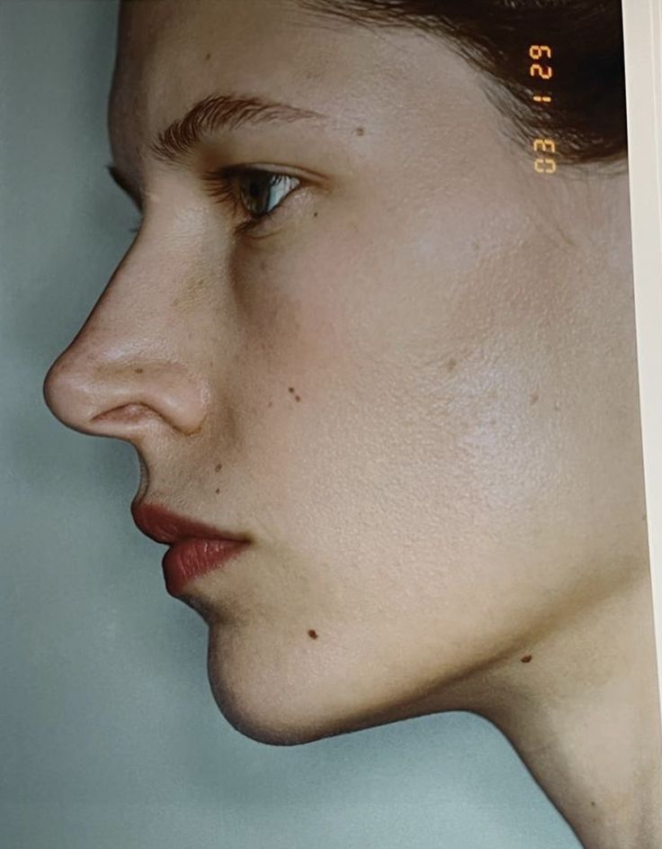 a close up of a person's face and nose