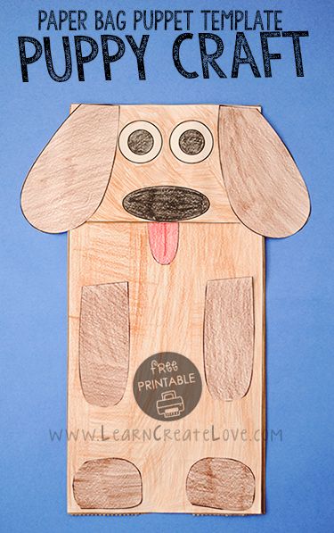 this paper bag puppet is made to look like a dog